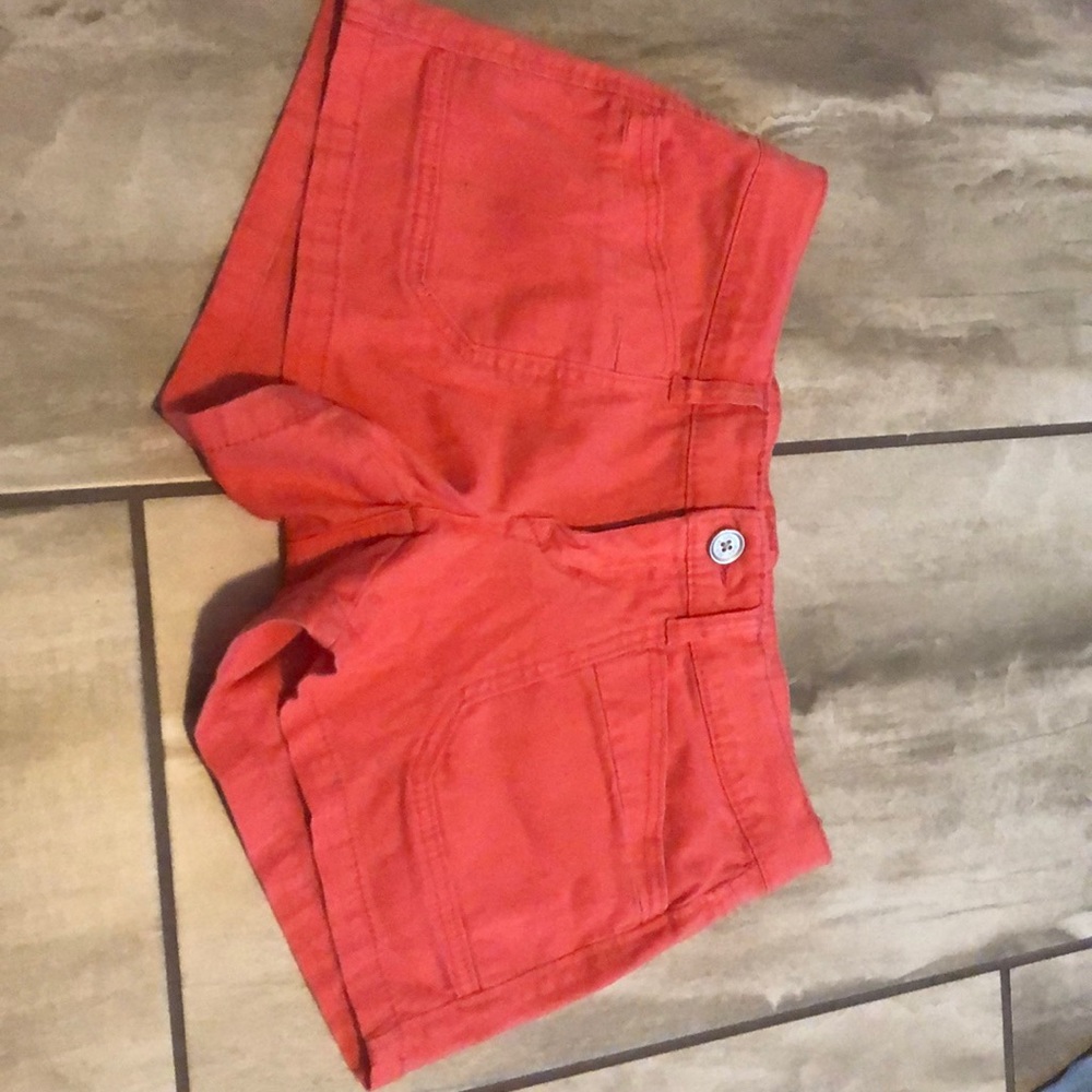 Size 7 orangish red shorts